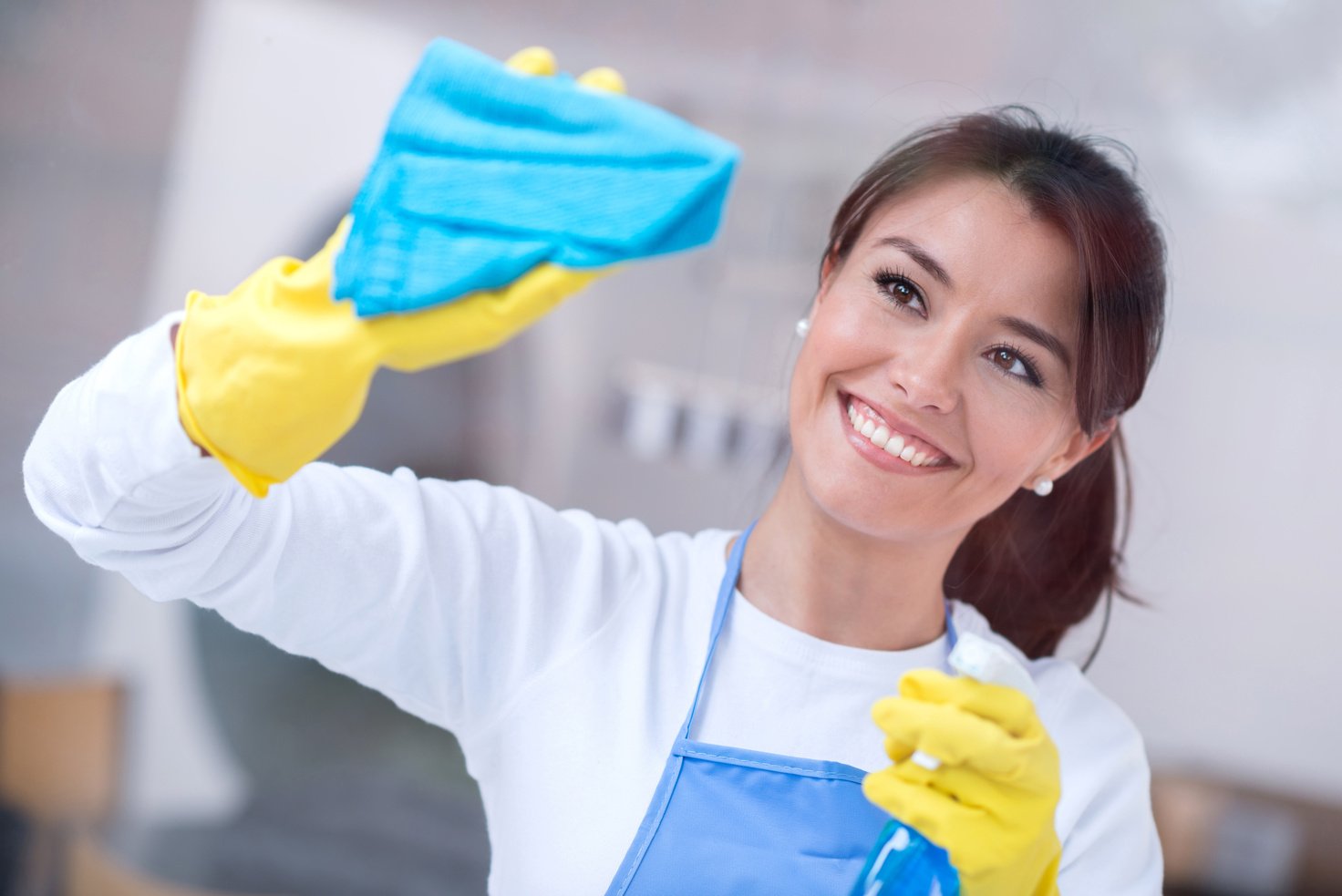 Woman cleaning the house